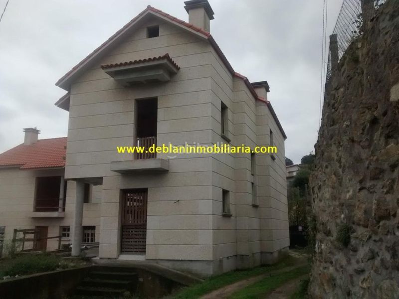 Foto 73b97752-9d4f-4936-a3b3-6c0b3ea8303d. Casa adosada en Moaña