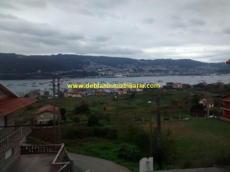 Foto b339a8e8-4580-4487-b6cc-29045f4ca4cd. Casa adosada en Moaña