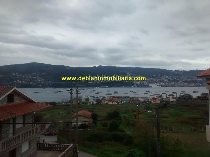 Foto 5d2370de-d96c-451f-b98f-3ad9037f346b. Casa adossada amb aparcament a Moaña