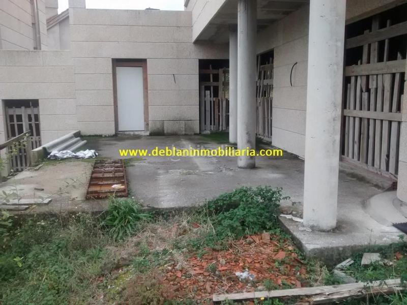 Foto 6d3134dd-50d7-419c-a9f8-4e33029c2959. Casa adossada amb aparcament a Moaña