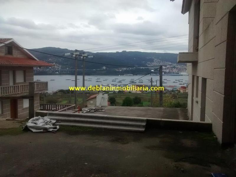 Foto caf3cff4-5498-4ebe-81d8-a988e0b9a7da. Casa adossada amb aparcament a Moaña