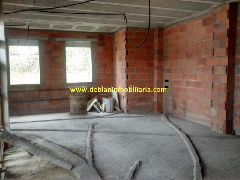 Foto f0ff4662-9f4e-4385-b6e8-9444e50f4131. Casa adossada amb aparcament a Moaña