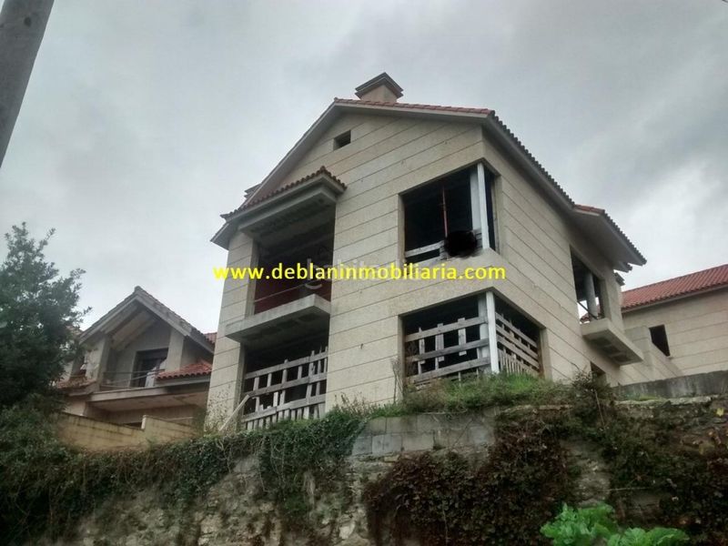 Foto aa2b2efa-e37b-465c-8d07-48c217a9fb6f. Casa adossada amb aparcament a Moaña