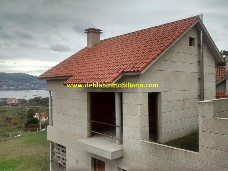 Foto c047136c-7c7d-4aab-83dc-8227c87aadba. Casa adossada amb aparcament a Moaña