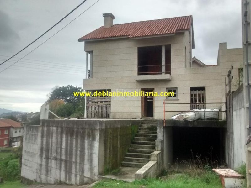 Foto d642ba33-4c24-4690-afa0-b898b1bbd01d. Casa adossada amb aparcament a Moaña