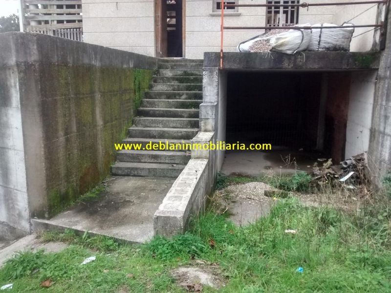 Foto e3a187b8-2c3f-4cca-9e57-0f3f618d0253. Casa adossada amb aparcament a Moaña