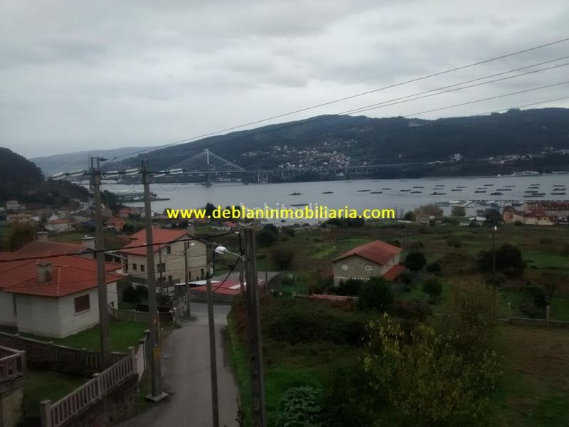 Foto eada80e8-6314-4c89-ae94-5e9ad18e9469. Casa adossada amb aparcament a Moaña