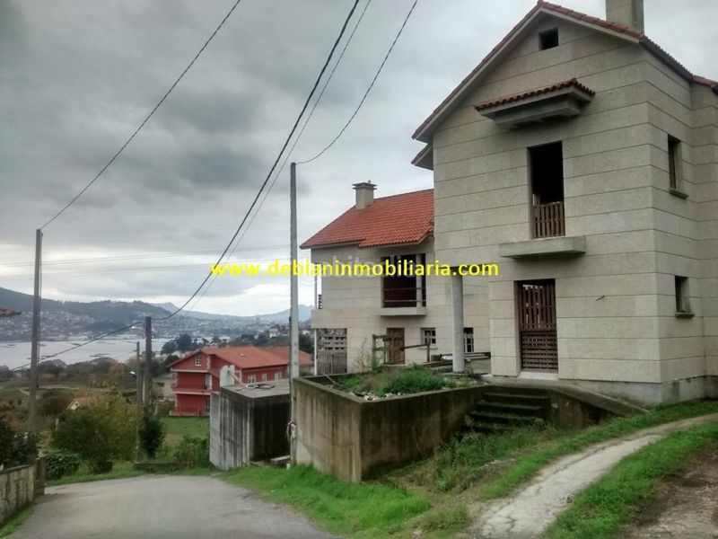 Foto 52d8b2fe-32a8-4330-8a91-6bc0d75759b1. Casa adosada en Moaña