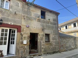 Masia a Ac-400 117. Casa de piedra restaurada en serres, ayuntamiento de muros.