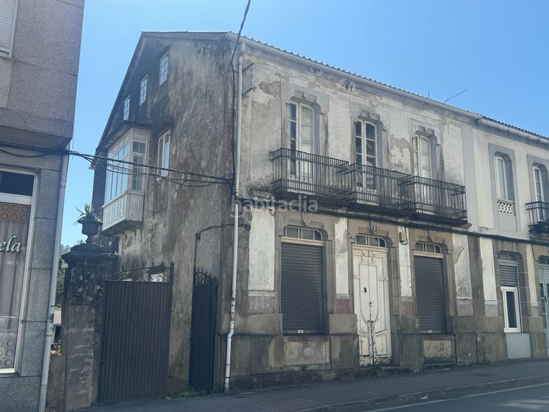 Foto dea08d8d-8ffc-4232-ab7e-7a2dfd594e82. Casa adossada a avenida compostela 8 a Outes