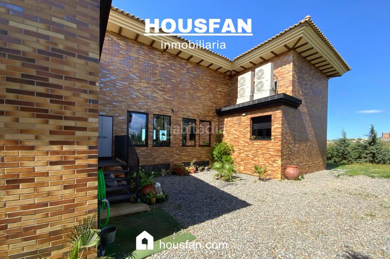 Foto 4e0f5393-69a3-4f17-823f-fe7705326e8f. Xalet amb xemeneia calefacció aparcament piscina a Cáceres