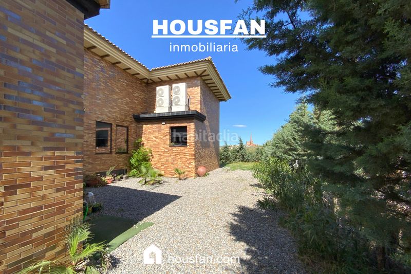 Foto 8ff6b2c4-b137-4f6e-8564-b5c2aa651867. Xalet amb xemeneia calefacció aparcament piscina a Cáceres