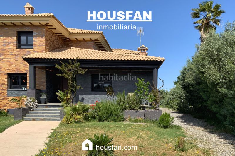 Foto c3ecb2a5-e9a7-4638-8a44-2f12108cad2e. Xalet amb xemeneia calefacció aparcament piscina a Cáceres