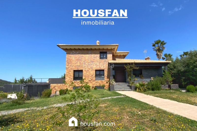 Foto dcf30244-c04f-476e-b810-1594aa87ddda. Xalet amb xemeneia calefacció aparcament piscina a Cáceres