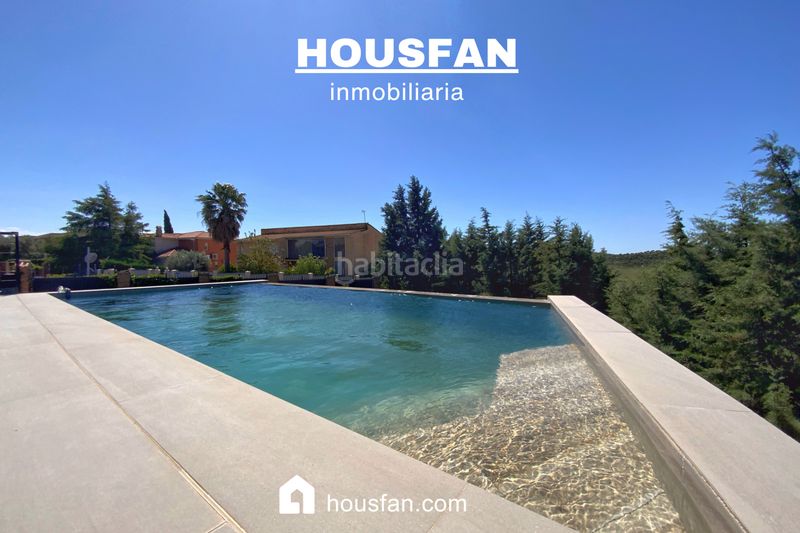 Foto e6d6b336-0be1-4284-8318-d3c4d25cdc60. Xalet amb xemeneia calefacció aparcament piscina a Cáceres