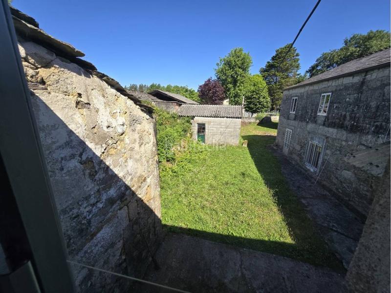Foto b1b026e1-d5ce-42b9-8701-1dfecfda0b05. Casa  con finca en narla en Friol