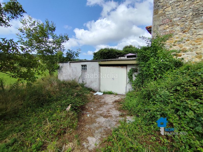 Foto f5d80670-62f6-4de3-a8eb-6ecd7fc8af75. Casa adossada a Güemes Bareyo