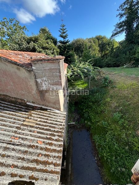 Foto 63750d51-73c7-4b3d-b050-c848645fd377. Masia amb xemeneia calefacció a Piñeiros - Freixeiro Narón