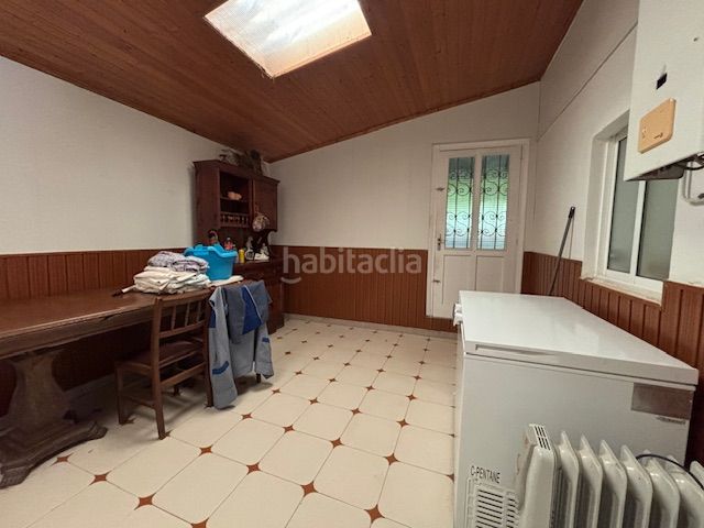 Foto f695cb07-ac8a-4495-86bd-f35adf8dc06b. Masia amb xemeneia calefacció a Piñeiros - Freixeiro Narón