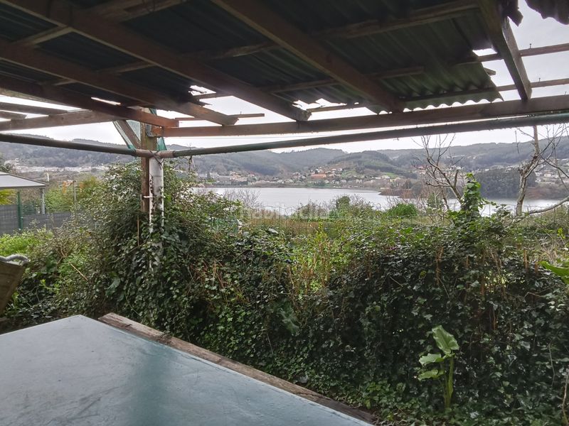 Foto 0617982f-50e4-4b97-9bff-d43f90301656. Casa adossada a Canido Ferrol