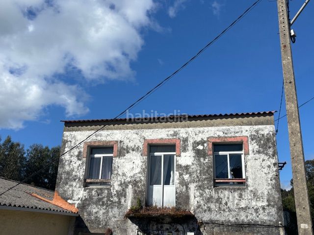 Foto d26199fc-3811-44c0-ac42-813bfd79729b. Casa adossada a Área Rural Ferrol