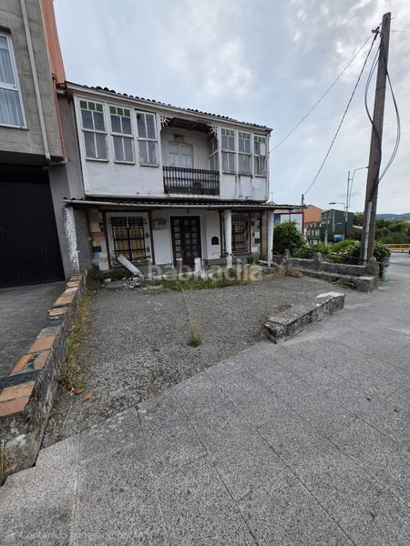 Foto 7da666b3-958a-439d-814e-d54f2416f010. Casa adossada a A Malata - Catabois - Ciudad Jardín Ferrol