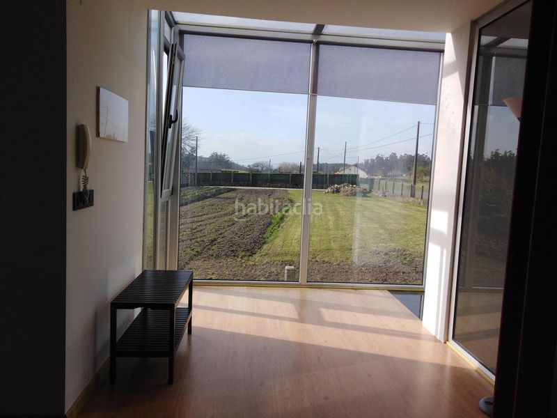 Foto 53c6fe1a-aaad-4a0e-ab84-14a789d47089. Casa a área de Ames Ames