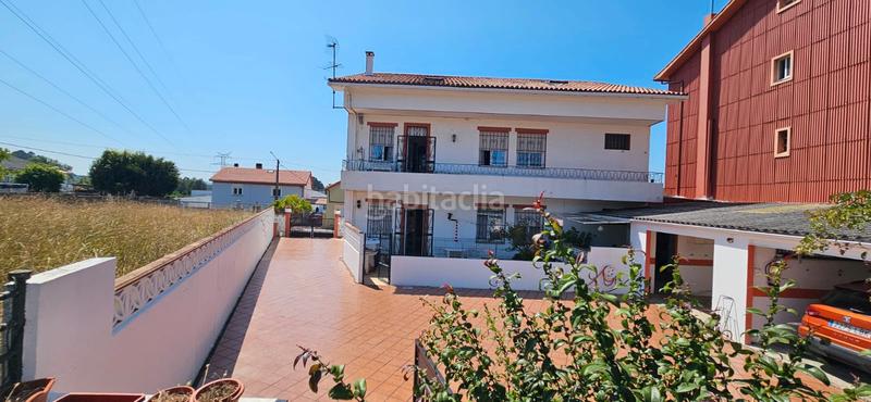 Foto 0bac35cd-cc23-4aa8-b395-3c99b8ba3cae. Casa  con 2 viviendas y finca en Piñeiros - Freixeiro Narón