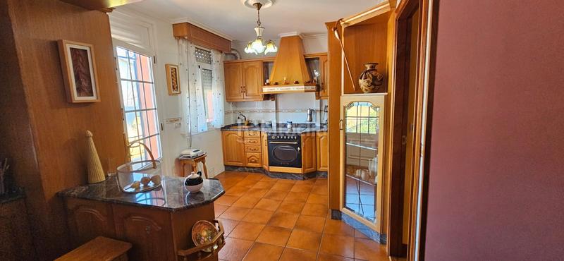 Foto a0ac1afa-7c51-450b-ae57-6b583609ed4f. Casa  con 2 viviendas y finca en Piñeiros - Freixeiro Narón