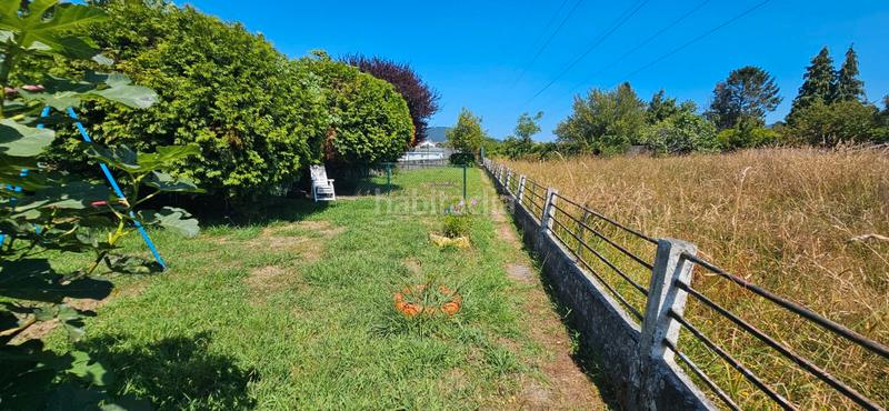 Foto a60e62b4-8a3c-45c1-8e14-624741a34ff4. Casa  con 2 viviendas y finca en Piñeiros - Freixeiro Narón