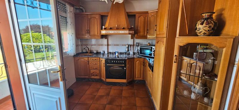 Foto c55d0bdf-dd01-4cad-b16a-ad5a507de4e0. Casa  con 2 viviendas y finca en Piñeiros - Freixeiro Narón