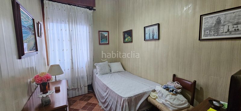 Foto 2d944822-f29f-4b6e-a7c3-9fa55af881d4. Casa aparellada a O Feal - Xubia Narón