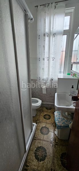 Foto ef8bccb6-9079-4609-98f1-36b675a33608. Casa aparellada a O Feal - Xubia Narón