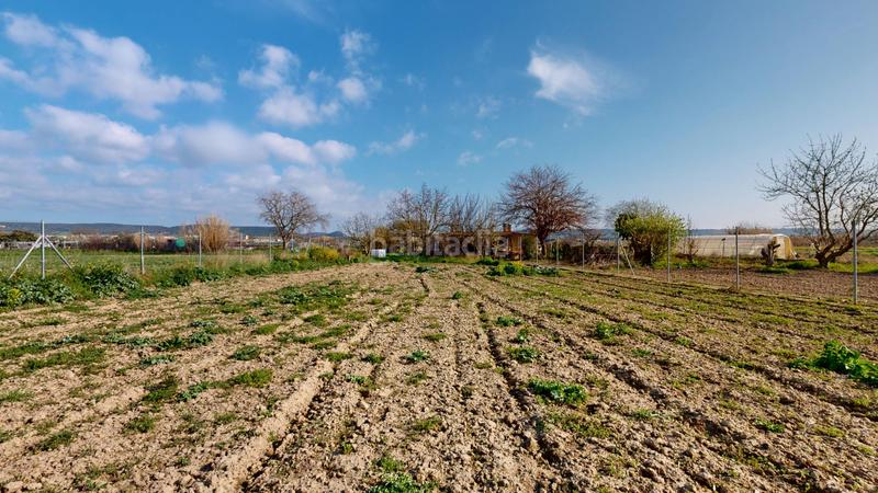 Foto 5a4f07a7-5928-4d5a-bd40-fd52f6ba239b. Terreno residencial finca rústica con edificación en Carcastillo