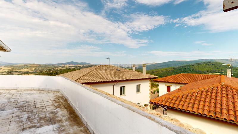 Foto aaf855b2-6c1d-4c19-a69d-d0e691814fd1. Casa adosada casa con terraza en Pueyo