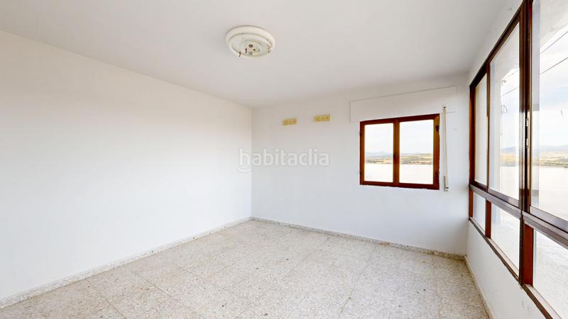 Foto cf9e8052-aad4-49bf-bd50-43a79592e720. Casa adosada casa con terraza en Pueyo