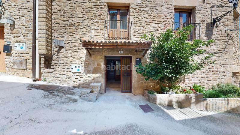 Foto ee4bd98a-5b8d-477d-96ce-5e46e1b65c4d. Casa adosada casa con terraza en Pueyo