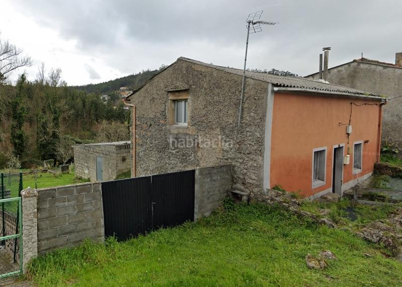 Foto c8311902-8e64-49ff-9a9d-a688e0f14a40. Casa amb aparcament a centro de Culleredo Culleredo