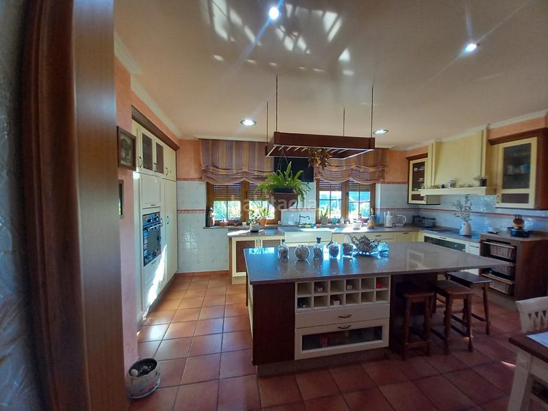 Foto b2570651-c2e6-49c3-9b6a-073b02ff9729. Chalet  de piedra a pocos metros de la playa en Ribeira