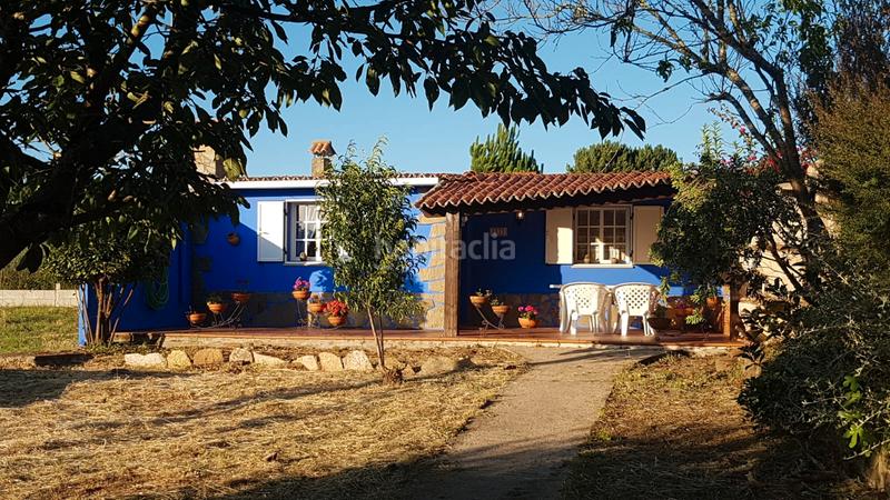 Foto b679d593-e06b-41a3-aaaa-fd4d2dbb699f. Chalet  de piedra a pocos metros de la playa en Ribeira