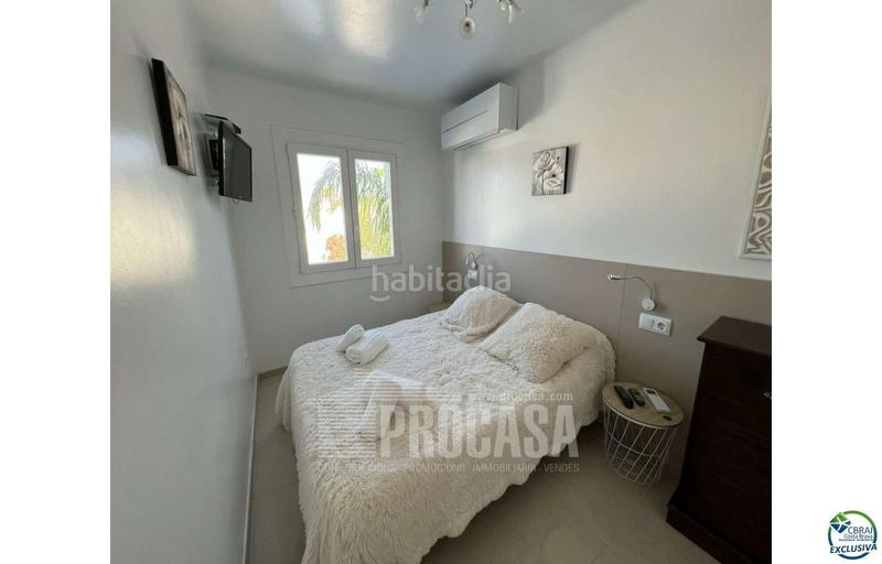 Foto 586cd1f5-6f7b-4076-a98c-0d262f760bee. Chalet avec parking piscine dans Cap Ras - Creus - Falconera Empuriabrava