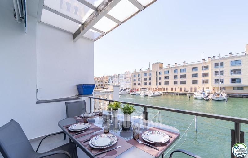 Foto c80b5f8b-4888-4ca0-8a94-1a0a7f0b619f. Casa adossada amb calefacció aparcament a Port Grec - Port Moxó Empuriabrava