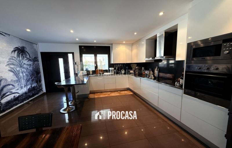 Foto 07467a4e-c4d6-44c0-ae25-c319a44b72f9. Chalet casa renovada al canal con amarre privado a en Empuriabrava