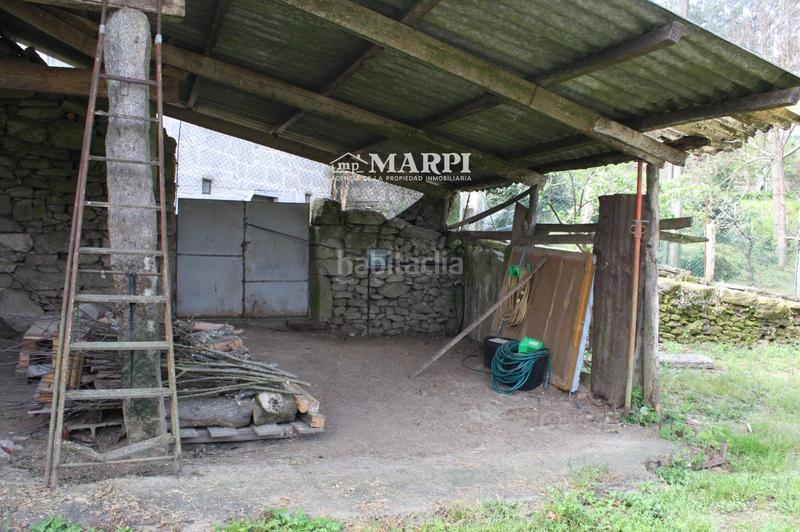 Foto ce3e5647-7858-4f0c-b76e-69fc330c993d. Finca rústica cobertizo con dos habitáculos cerrado. en Ponteareas