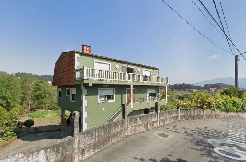 Foto c24c48fd-e8f4-455f-8c26-f2dc21f7514c. Maison avec parking dans Mos