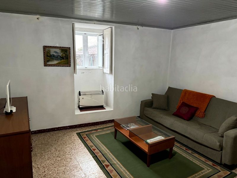 Foto f4d52394-c037-4fe3-9a33-db2ee5c6b804. Casa adossada a Cañiza (A)