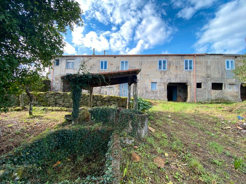 Foto 62248b2a-99fb-426a-b08b-4e0c632da988. Haus mit parking in Crecente