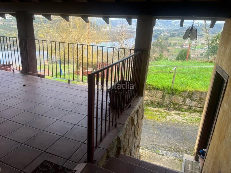 Foto 1120f126-912b-4fdc-a445-bcbfad3f3511. Casa con camino riscaldamento in Castrelo de Miño