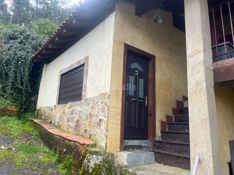 Foto 4dc9fc6e-7e3c-4bad-859d-a415217cb526. Casa con camino riscaldamento in Castrelo de Miño