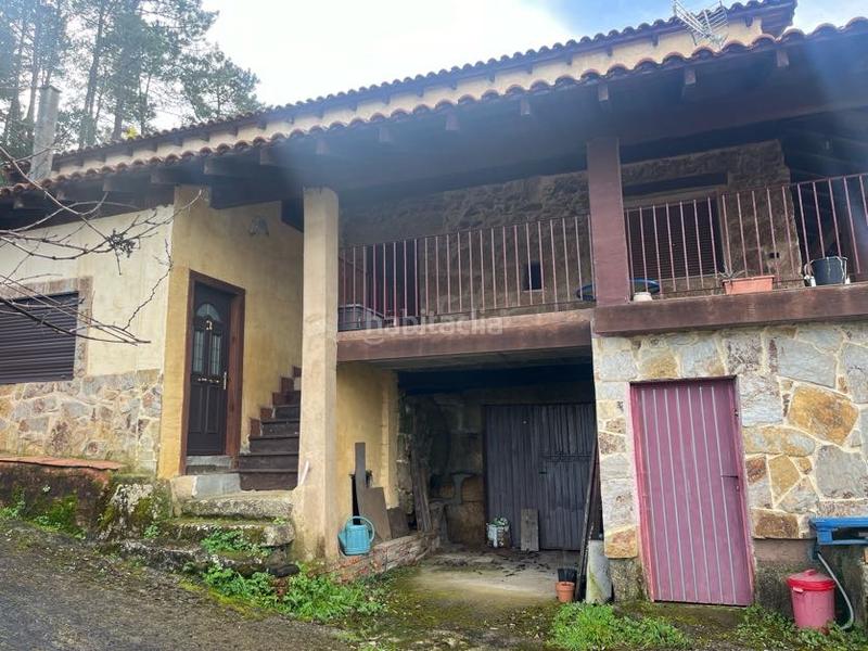 Foto b9fdef64-f61b-4caf-b426-431fb7945855. Casa con camino riscaldamento in Castrelo de Miño